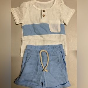 Like blue and white boys shirt and short set.